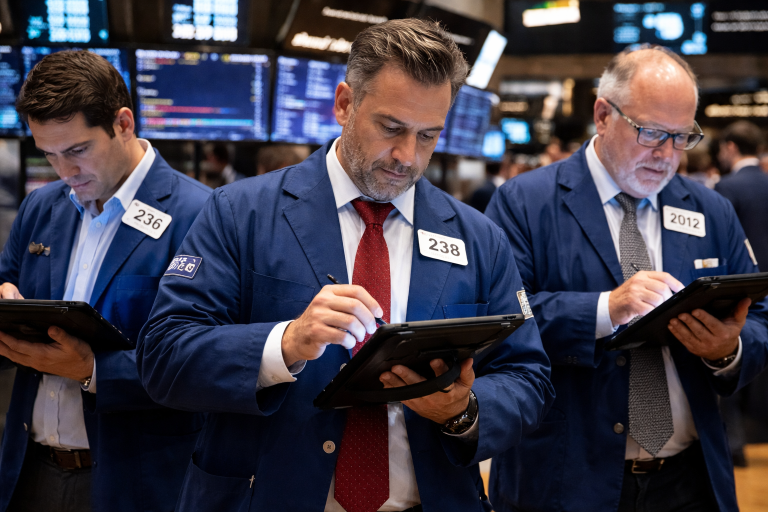 Dow slips as strong US jobs data sparks chip selloff, hits Nasdaq